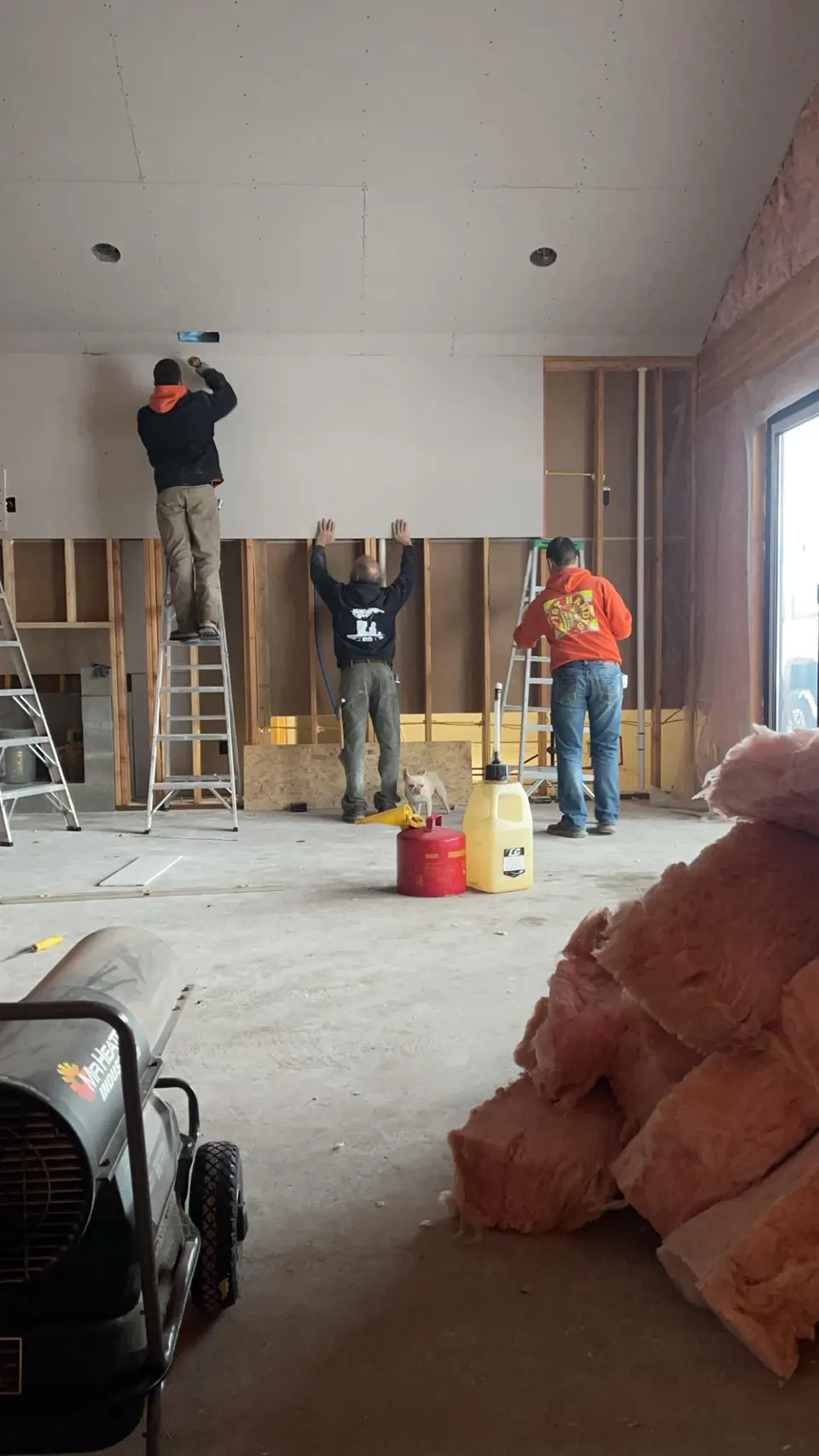Handy's Construction team installing drywall on a residential project in Missoula MT